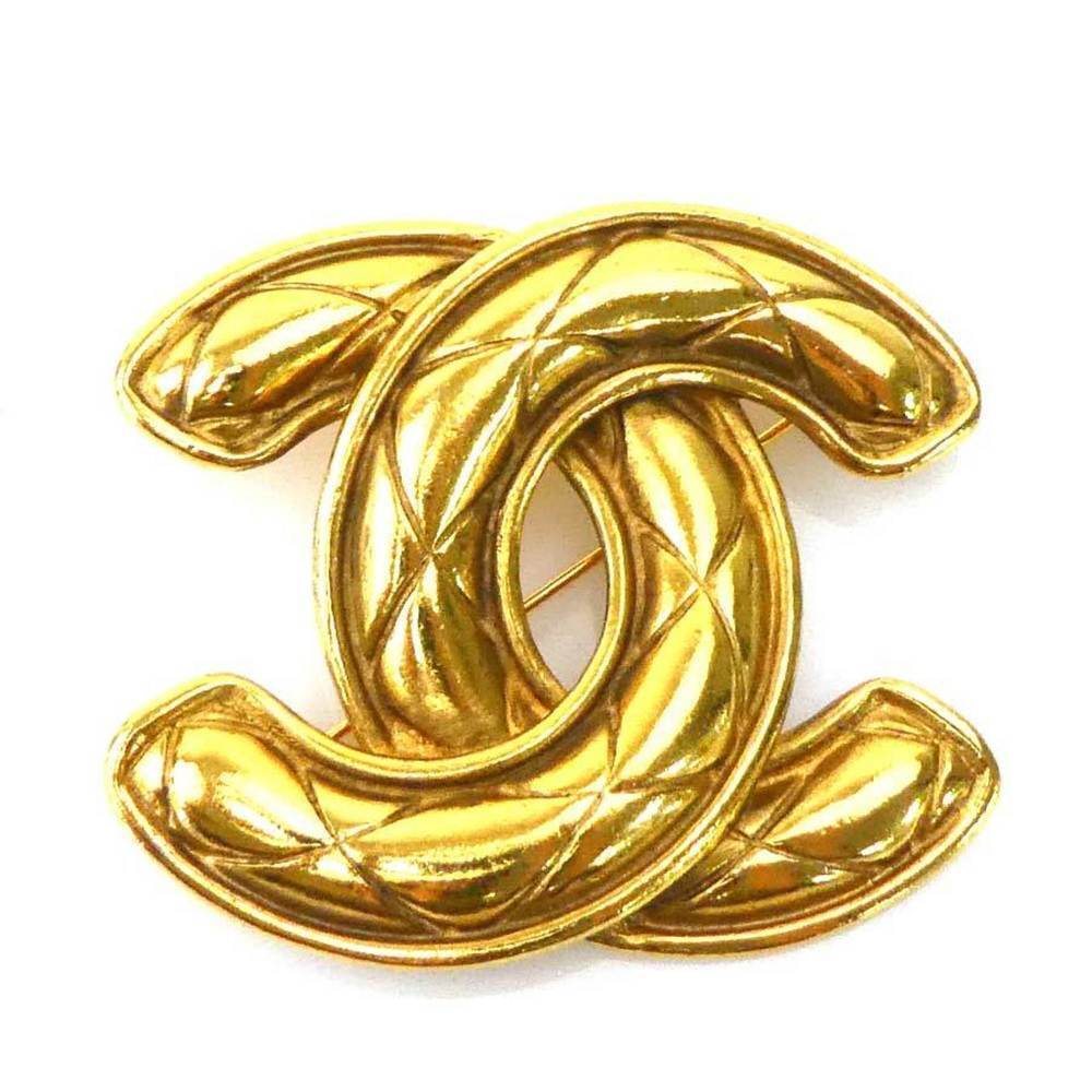 CHANEL Gold Logo Brooch
